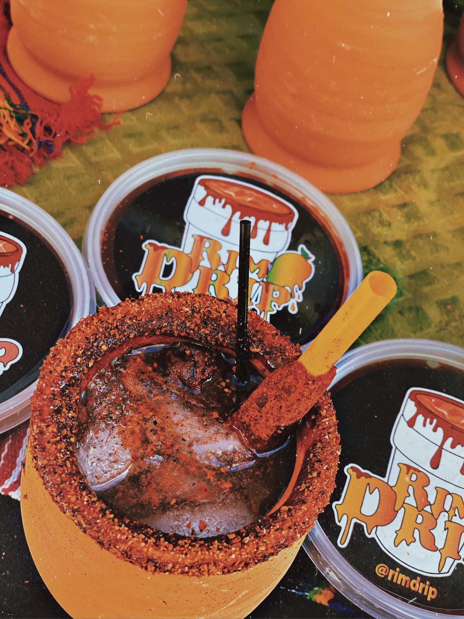 Rim Drip branded gummy rings — sweet and chamoy versions
