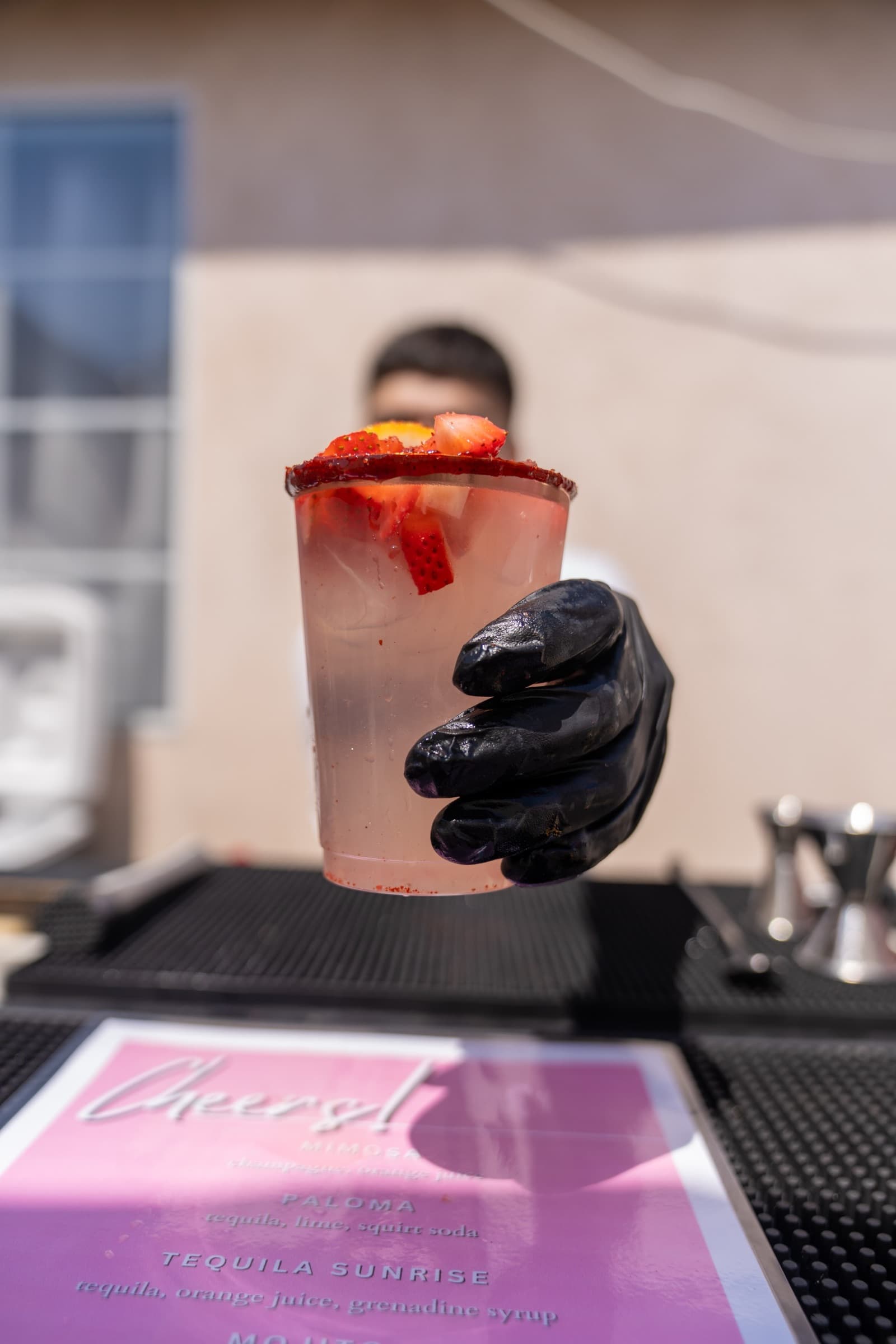 Strawberry michelada handed over a Rimdrip bar setup
